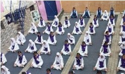 Students participating in yoga